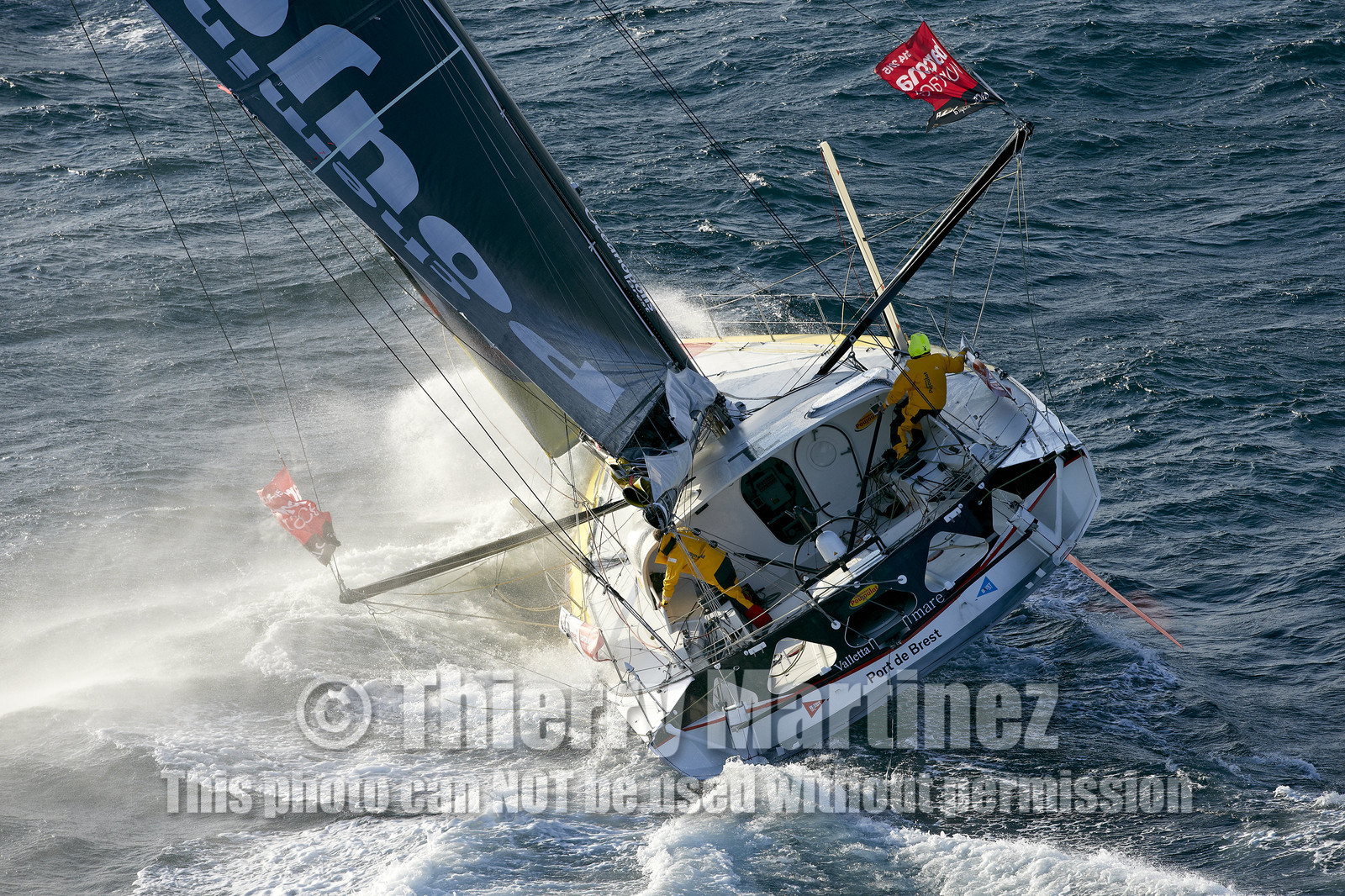 2014 BARCELONA WORLD RACE. Bernard Stamm (SUI) & Jean Le Cam (FRA) on CHEMINEES POUJOULAT